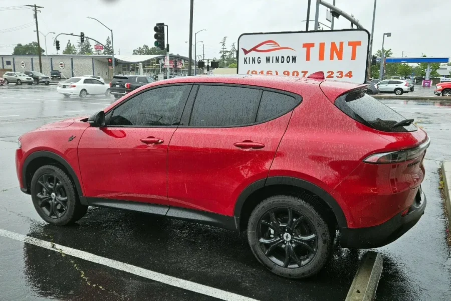 Red 2023 Dodge Hornet with freshly tinted windows, photographed after its tint job at King Window Tint in Sacramento