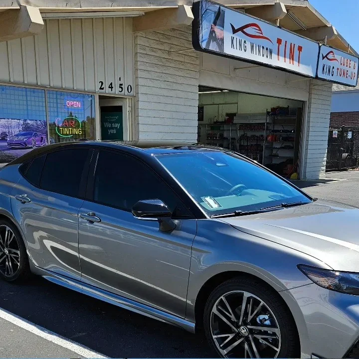 Silver 2025 Toyota Camry with freshly tinted windows, photographed after its tint job at King Window Tint in Sacramento