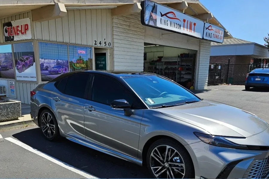 Silver 2025 Toyota Camry with freshly tinted windows, photographed after its tint job at King Window Tint in Sacramento