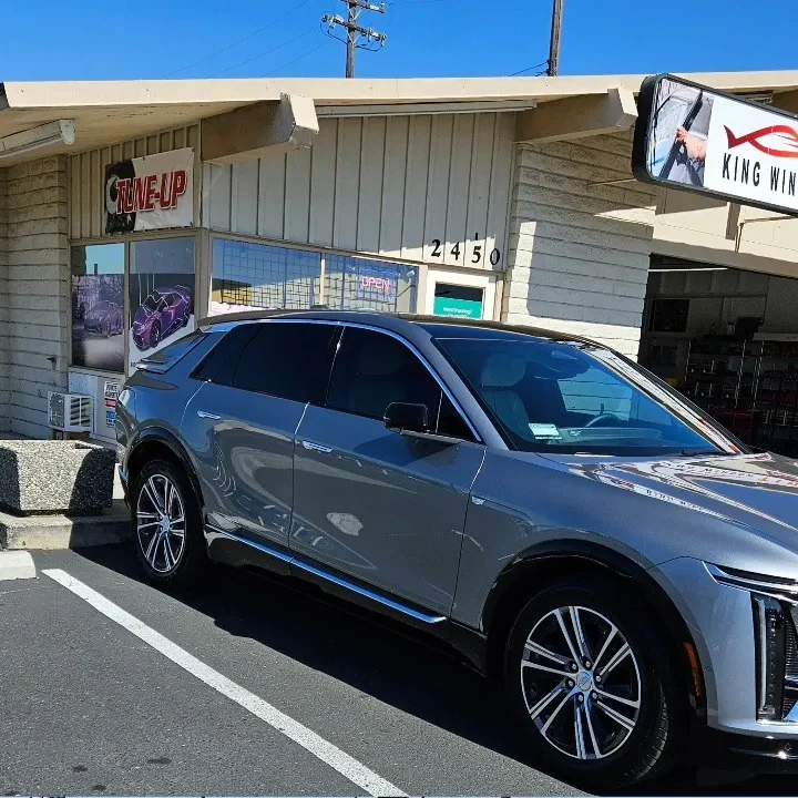 Silver Cadillac Lyriq with freshly tinted windows, photographed after its tint job at King Window Tint in Sacramento