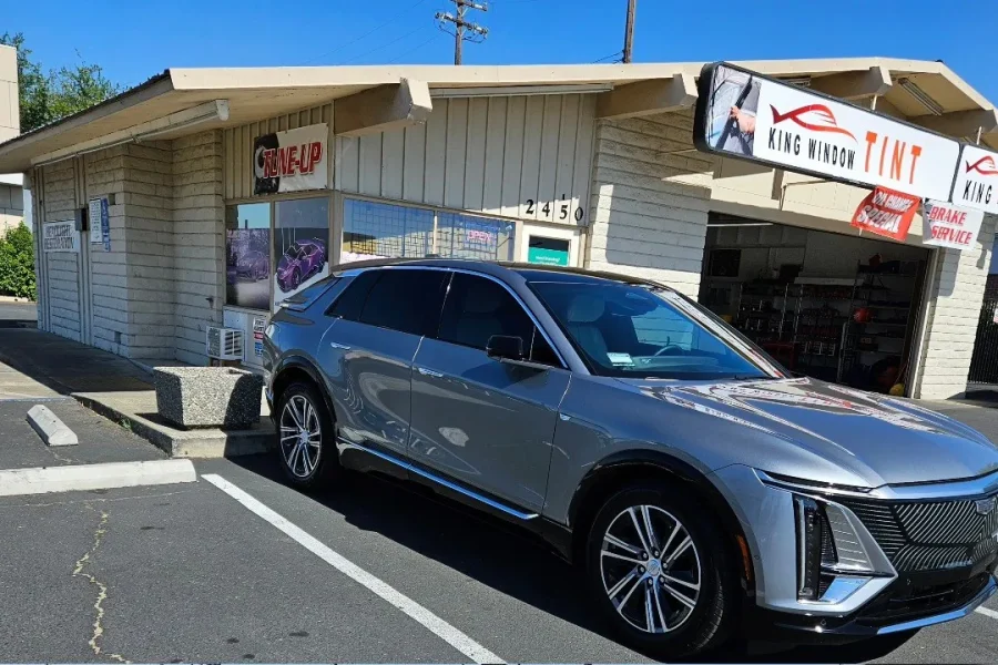 Silver Cadillac Lyriq with freshly tinted windows, photographed after its tint job at King Window Tint in Sacramento