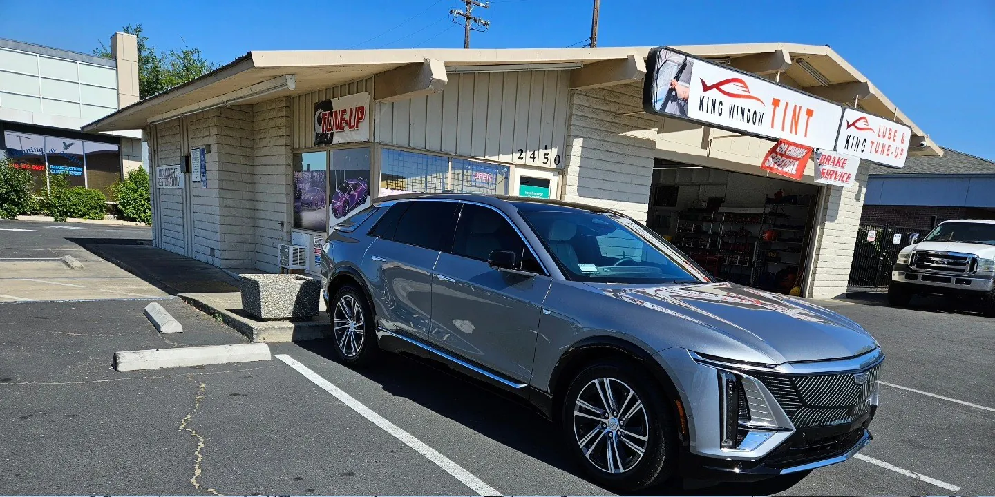Silver Cadillac Lyriq with freshly tinted windows, photographed after its tint job at King Window Tint in Sacramento