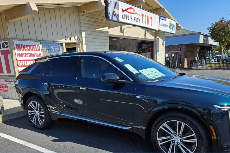 Black Cadillac Lyriq with freshly tinted windows, photographed after its tint job at King Window Tint in Sacramento