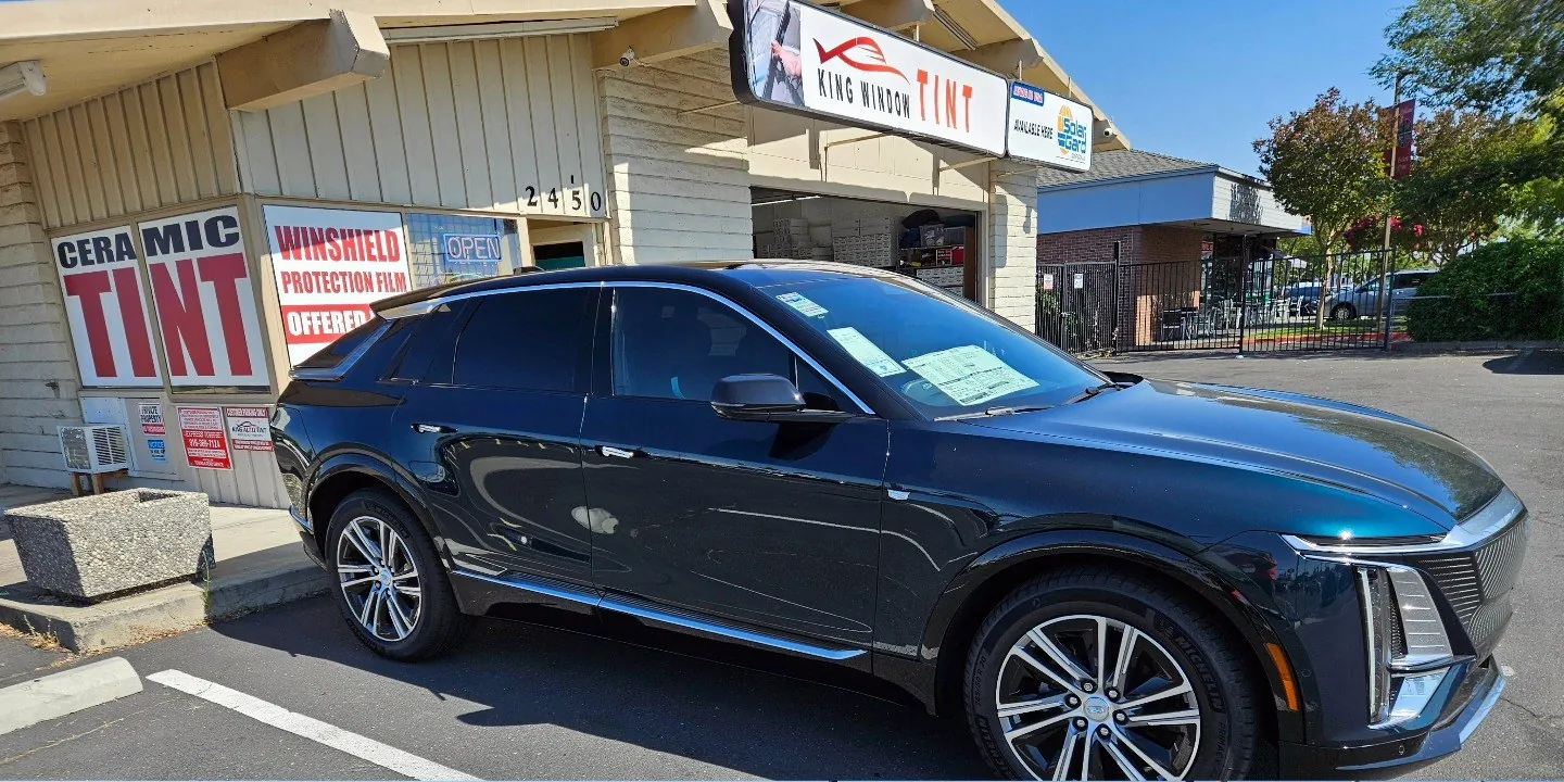 Black Cadillac Lyriq with freshly tinted windows, photographed after its tint job at King Window Tint in Sacramento