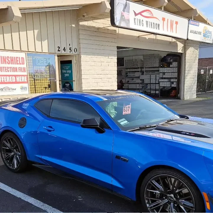Blue Chevrolet Camaro with freshly tinted windows, photographed after its tint job at King Window Tint in Sacramento