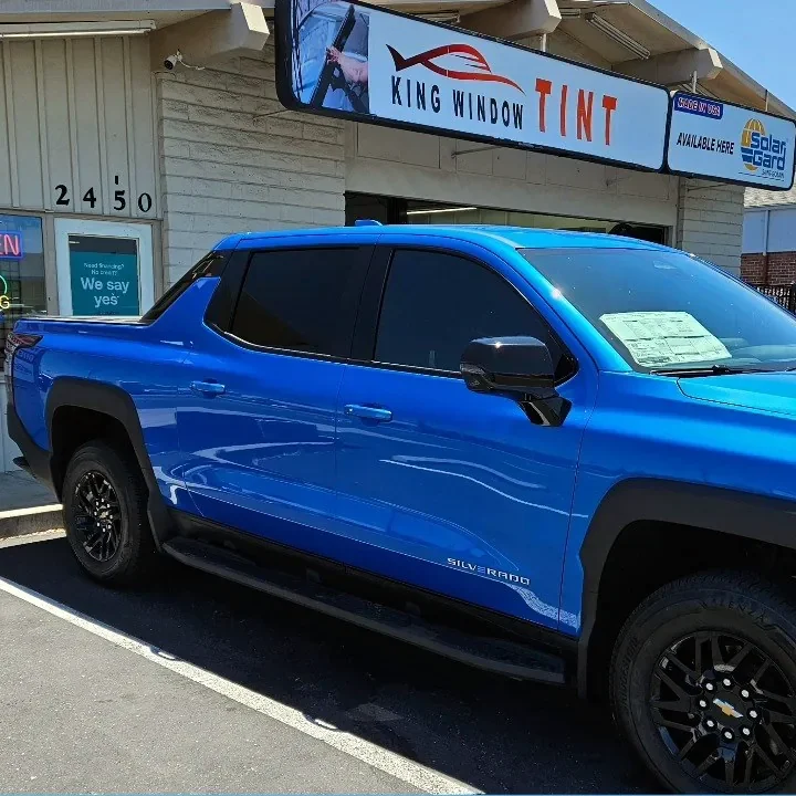 Blue Chevrolet Silverado EV with freshly tinted windows, photographed after its tint job at King Window Tint in Sacramento