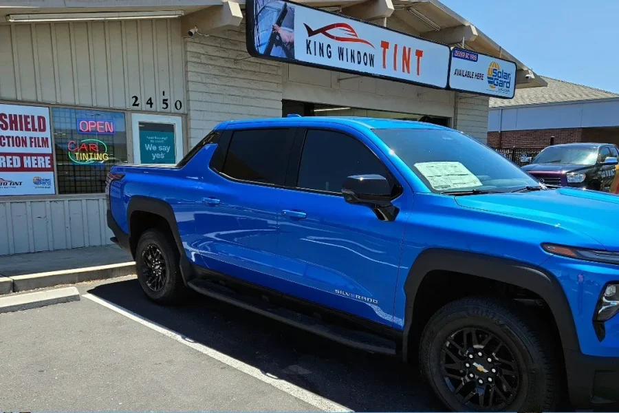 Blue Chevrolet Silverado EV with freshly tinted windows, photographed after its tint job at King Window Tint in Sacramento