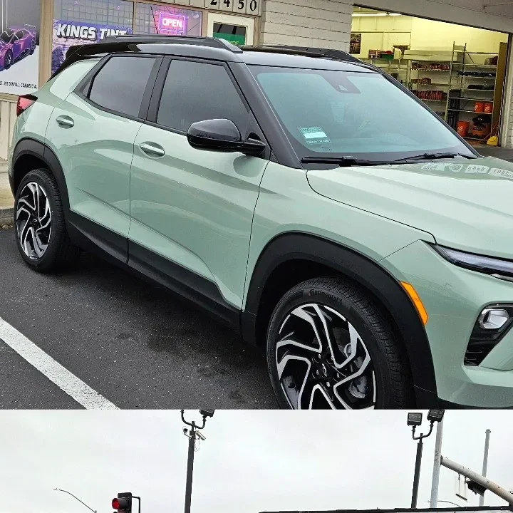 Mint green Chevrolet Trailblazer with freshly tinted windows, parked in front of King Auto Tint at 2450 Fulton Ave, Sacramento