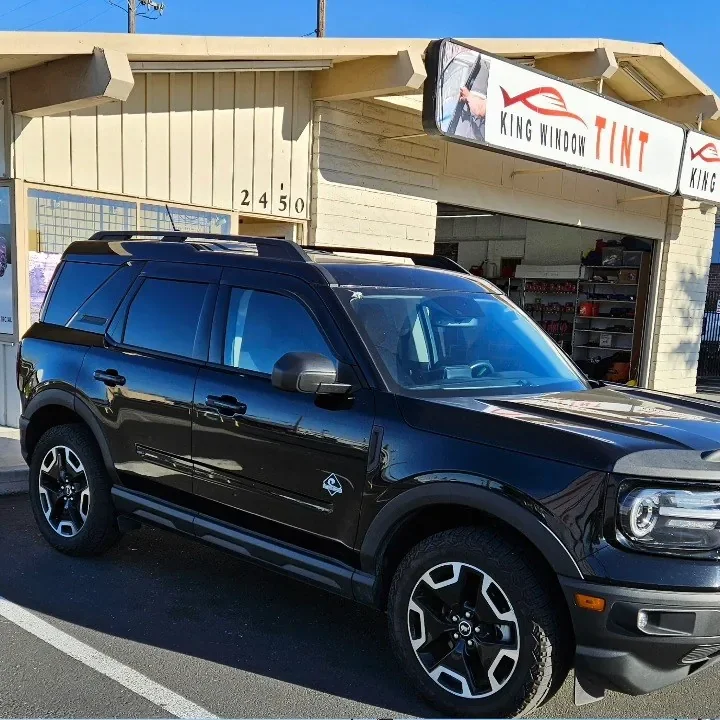 Black Ford Bronco Sport with freshly tinted windows, in the King Window Tint parking lot on Fulton Avenue, Sacramento