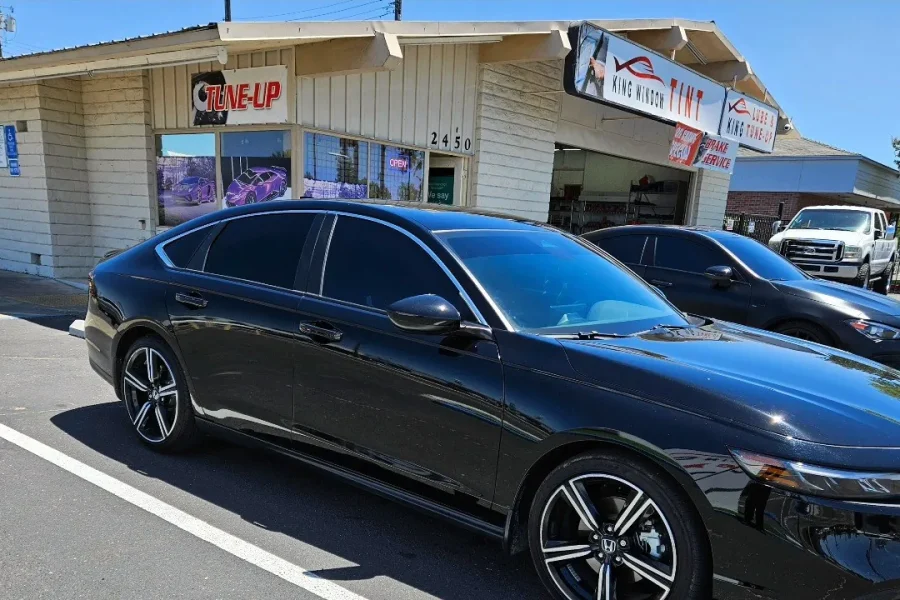 Black Honda Accord with freshly tinted windows, in the King Window Tint parking lot on Fulton Avenue, Sacramento