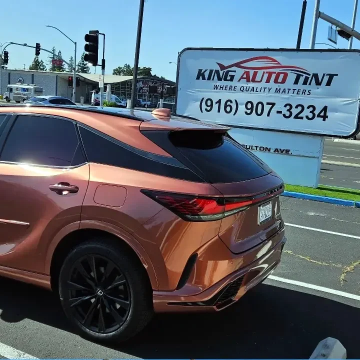 Copper Lexus RX with freshly tinted windows, photographed after its tint job at King Auto Tint in Sacramento