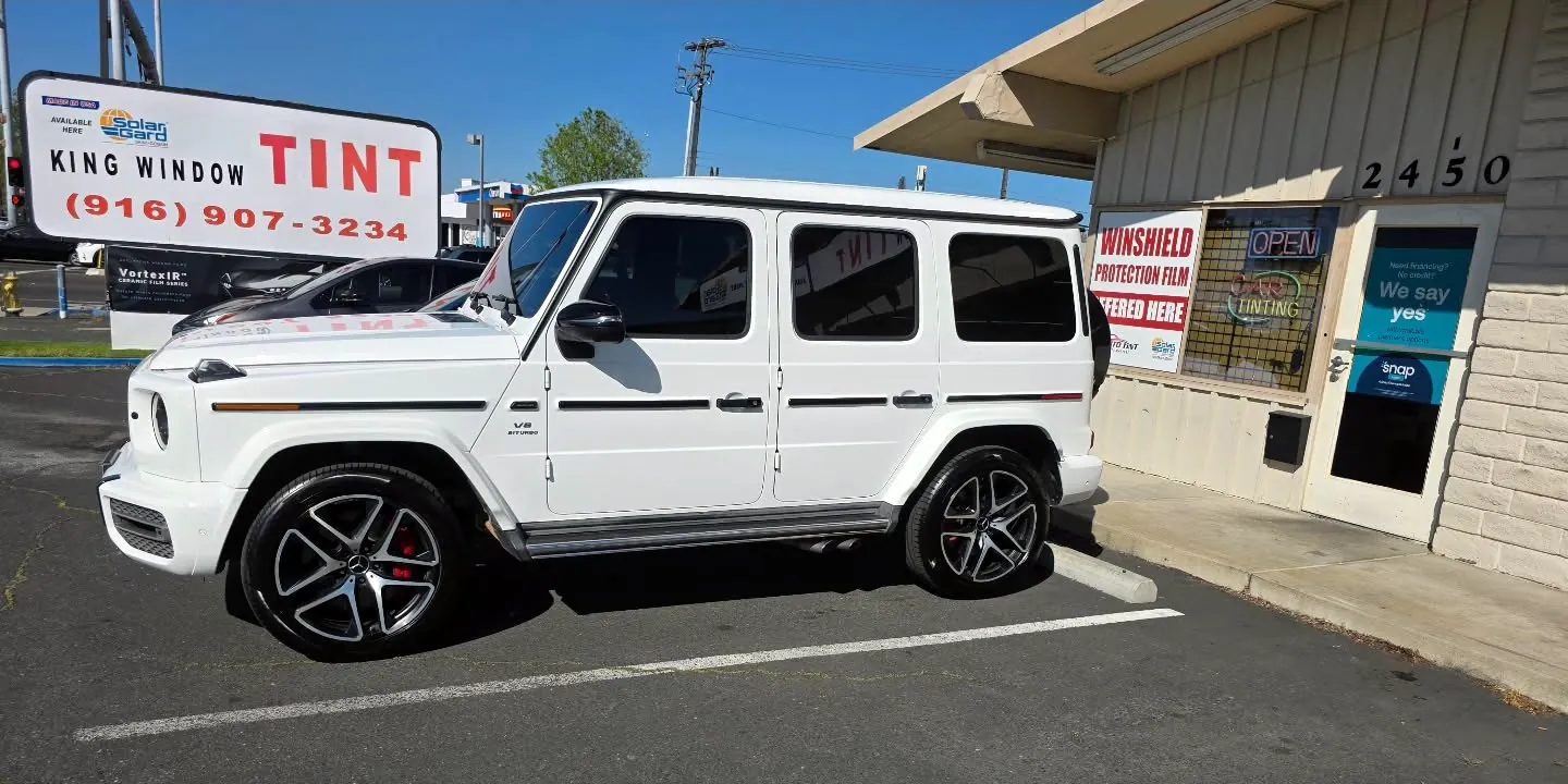 White Mercedes-AMG G 63 with freshly tinted windows, photographed after its tint job at King Window Tint in Sacramento — second angle