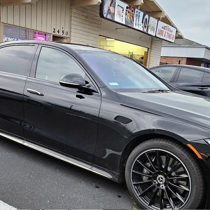 Black Mercedes-Benz E-Class with freshly tinted windows, photographed after its tint job at King Auto Tint in Sacramento