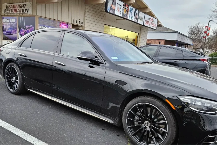 Black Mercedes-Benz E-Class with freshly tinted windows, photographed after its tint job at King Auto Tint in Sacramento