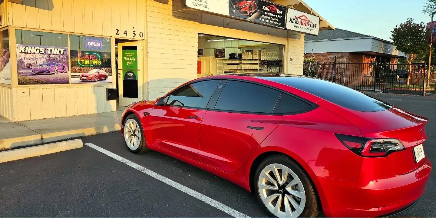 Freshly tinted sedan parked outside King Auto Tint on Fulton Ave in Sacramento