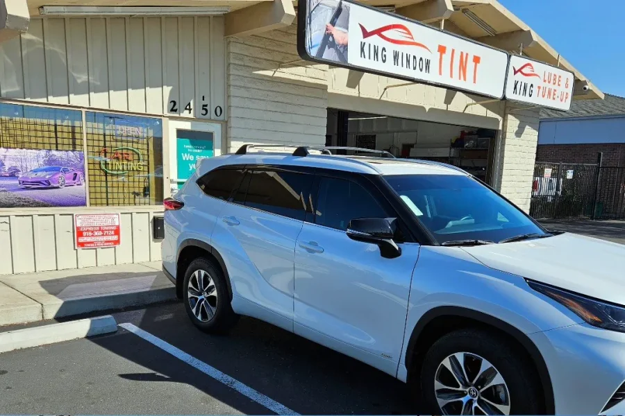 White Toyota Highlander with freshly tinted windows, photographed after its tint job at King Window Tint in Sacramento
